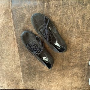 Black, lace up Vans, good condition.
